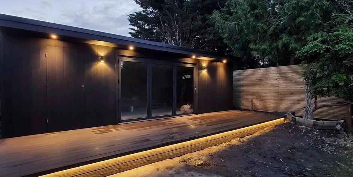 Professional outdoor deck lighting installation with LED strips